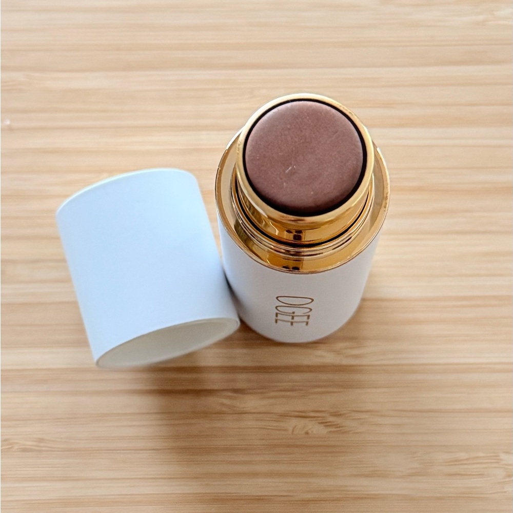 New but no box.  Ogee Copper Sculpted Face Stick